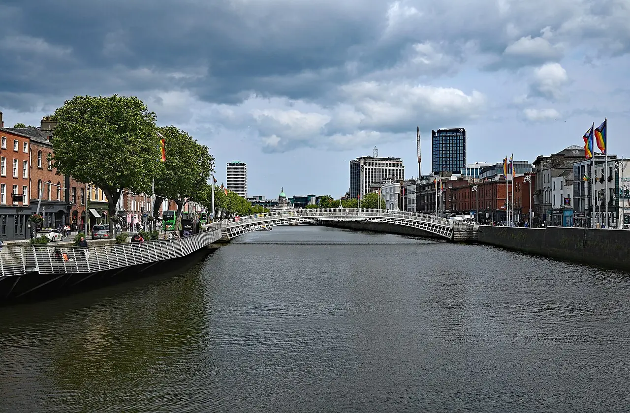 River Liffey with Ha'Penny Bridge in distance, Dublin, Ireland