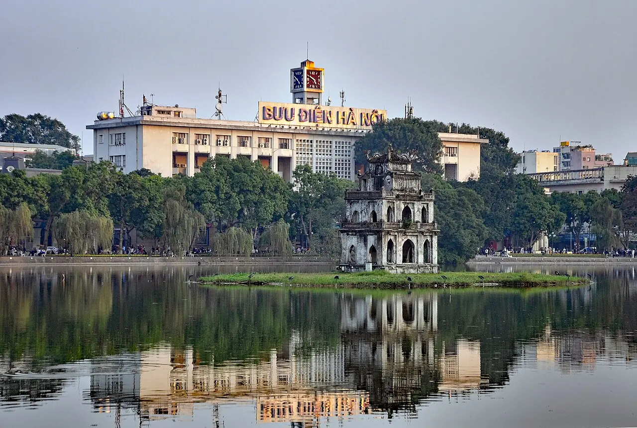 Turtle Tower (Tháp Rùa) with Hanoi Post Office behind, Hoàn Kiếm Lake, Hanoi, Vietnam