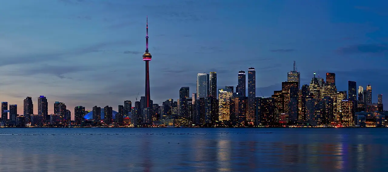 Picture of the Toronto skyline at sunset taken from the Snake Islands of the Toronto Islands . This is a crop of a larger panorama.